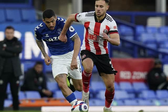Sheffield United's George Baldock is drawing interest from Celtic who are keen to take the full-back to Scotland. Andrew Yates / Sportimage