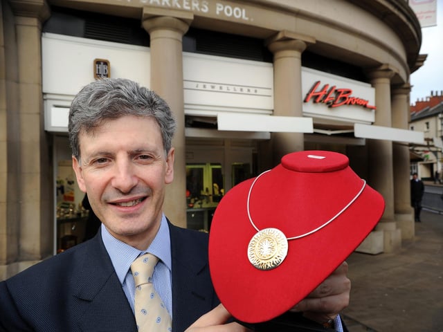 James Frampton, managing director of H.L. Brown Jewellers, Barker's Pool, Sheffield, with the limited edition commemorative pendant to celebrate the company's 150th anniversary, on February 10, 2011