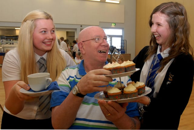 Demi Turnball and Jayden Blacklock serve tea to John Allan Lee eight years ago but what was the occasion?
