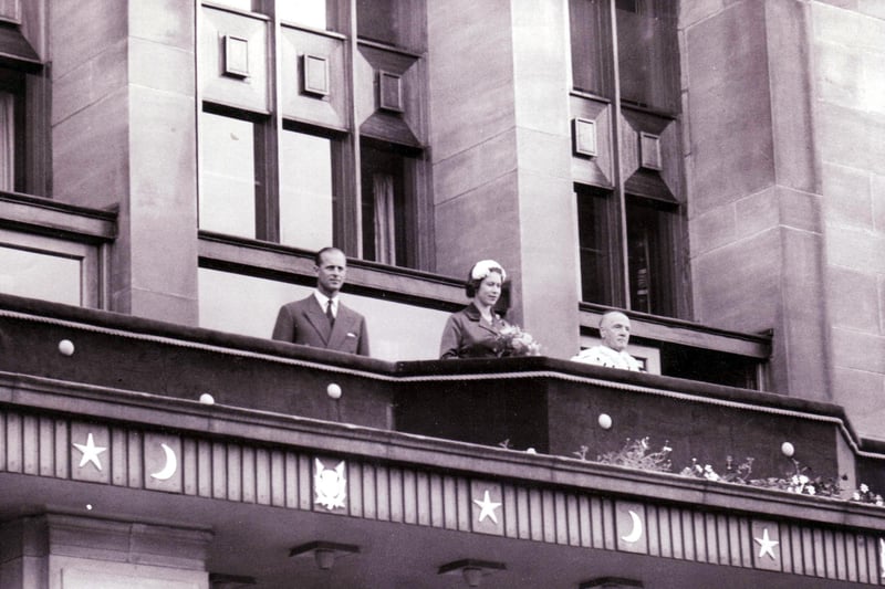 Prince Phillip and The Queen on the balcony above the Town House in Kirkcaldy in 1958