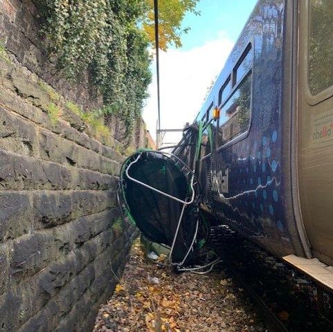 Advising customers to be aware of and stay safe in the windy conditions, ScotRail posted a picture of a trampoline blown onto the tracks and crushed by one of their trains in Scotland.