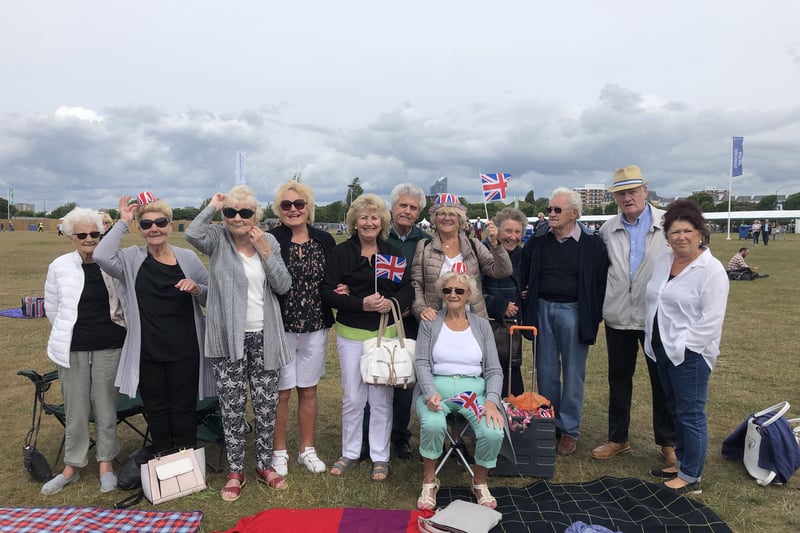 Portsmouth residents enjoying the day at Southsea Common. Louis Le Du, second in from right, Phyllis Cummings, fifth in from right, and Carol Dent, fourth from left. Picture: Annie Lewis