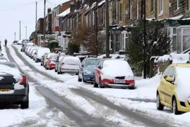 Cars covered in snow in Sheffield