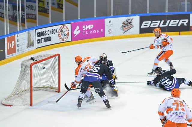 Sam Jones equalises for Sheffield Steelers against Manchester Storm.  Pic Dean Woolley