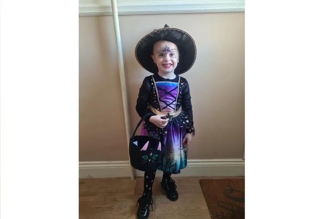 Demi-Rose aged 4 being a scary witch