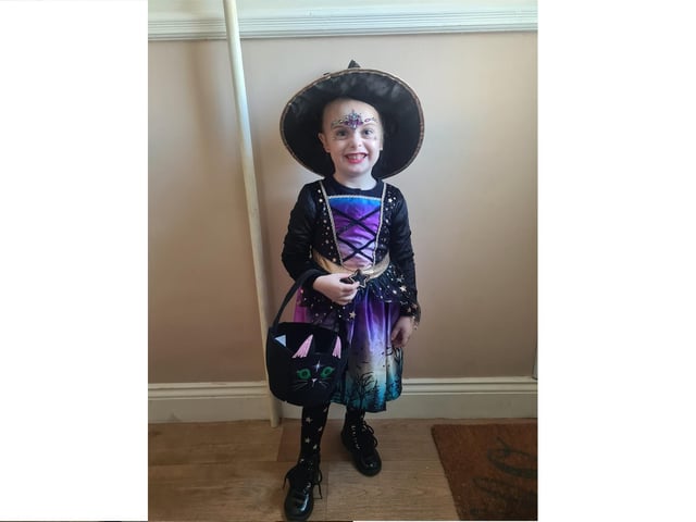 Demi-Rose aged 4 being a scary witch