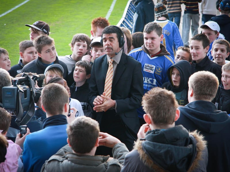 Former Pompey player turned TV pundit Chris Kamara makes his way to his position in the ground before going on air. Picture: Habibur Rahman