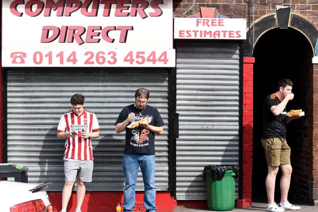 Fans enjoy their pre-match chips prior to the Sky Bet Championship against Swansea City at Bramall Lane in August 2018.