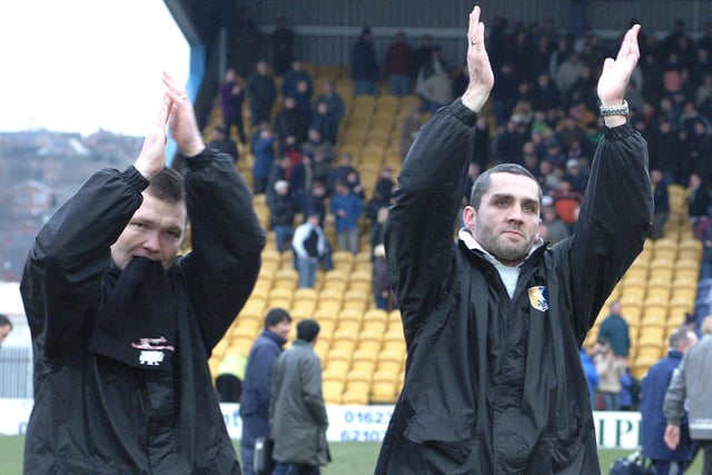 Assistant manager Neil Richardson and manager Stuart Watkiss salute the fans after a crucial home win over promotion rivals Scunthorpe United.