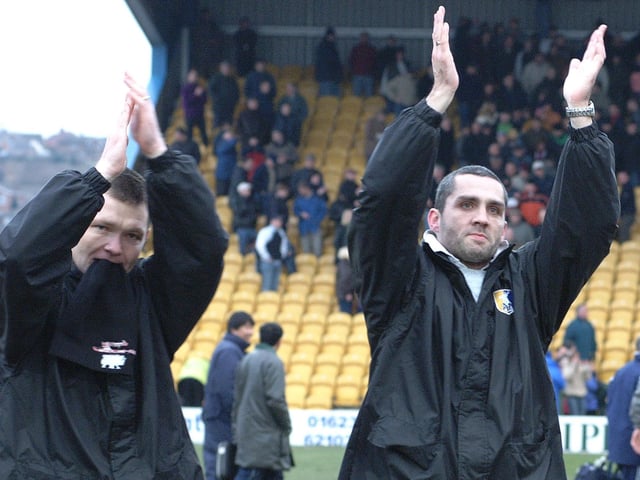 Assistant manager Neil Richardson and manager Stuart Watkiss salute the fans after a crucial home win over promotion rivals Scunthorpe United.