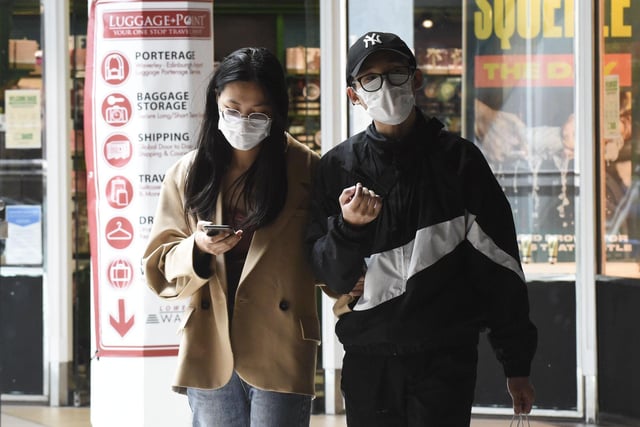 A couple pictured wearing masks in Waverley Mall. All customers are obliged to wear face masks in the shopping centre after Scotland's first minister Nicola Sturgeon made 
them mandatory when in shops