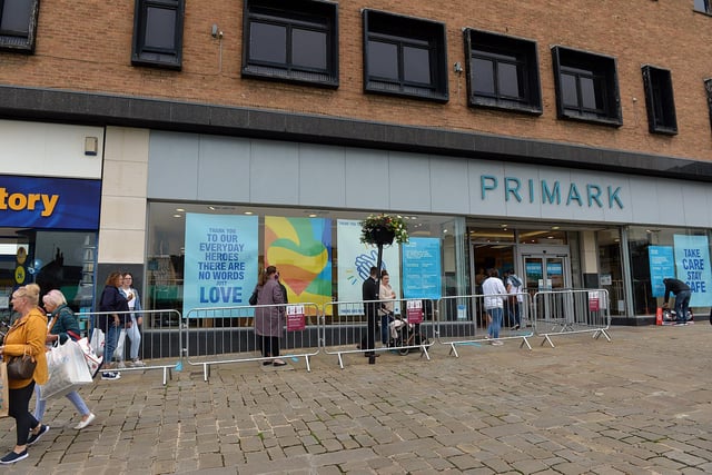 Shoppers que to get into Primark.