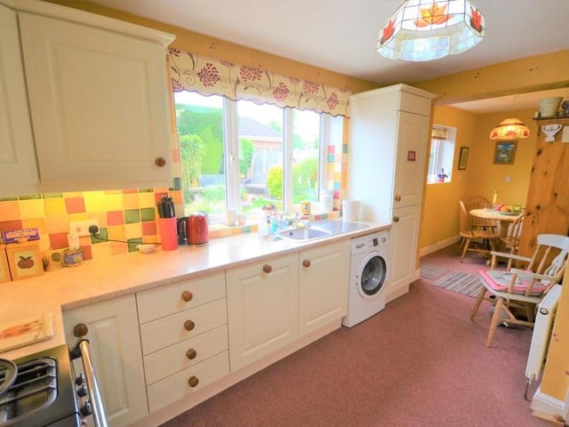 Kitchen - A well presented kitchen with an excellent range of shaker style wall and base units finished in cream with contrasting work surfaces, ceramic wall tiles and under wall cupboard lighting, having a stainless steel wash bowl with draining board, nicely positioned to a UPVC double glazed window which provides a great outlook to the rear garden, all integrated appliances are Bosch and include a tall fridge freezer, separate additional freezer and a brand new dishwasher, there is space for a free standing 90mm Rangemaster cooker and provisions for a washing machine. There is a useful storage cupboard and open plan access to the breakfast room.