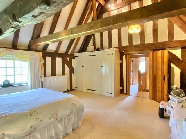 And so we move on the first of the eight beautiful bedrooms at The Gables Farm. It has a fitted storage cupboard and a window to the side.