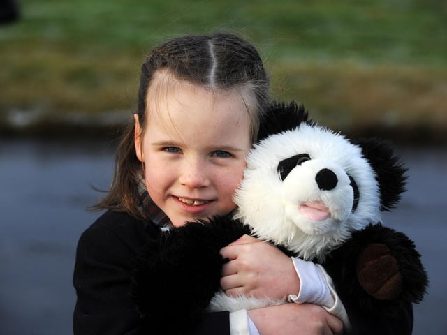 Maisie Dalton - an Evening News competition winner - was at Edinburgh Airport to see the Pandas arrive, before a police escort took them to Edinburgh Zoo