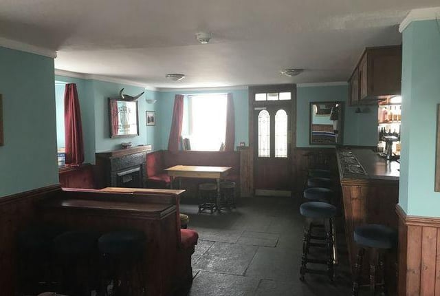 A traditional bar for sensible whiskey drinking and live music.