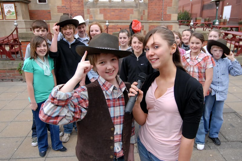 Children from the Westovians were singing and dancing in King Street with songs from their production of Oklahoma in 2008.
