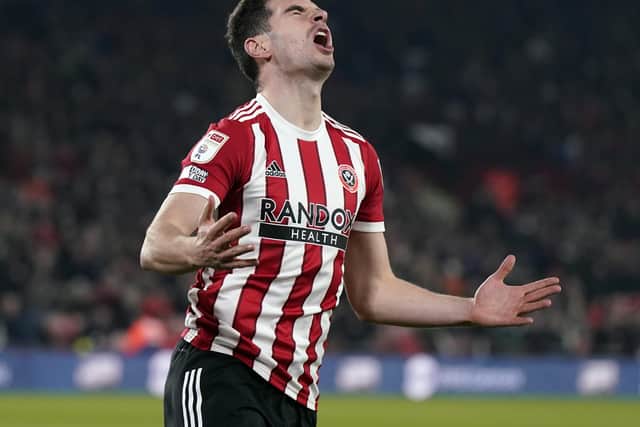 Sheffield United's John Egan is glad the pressure is on at this stage of the season: Andrew Yates / Sportimage