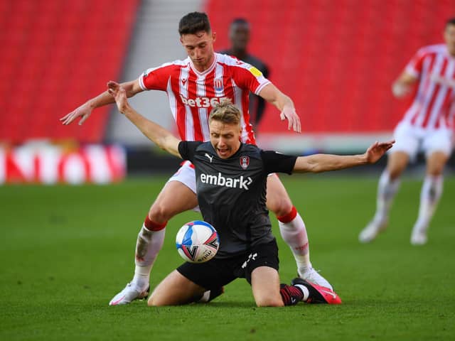 Jamie Lindsay of Rotherham United is challenged by Stoke City's Jordan Thompson during the Sky Bet Championship clash at the Bet365 Stadium on Saturday. (Photo by Gareth Copley/Getty Images)