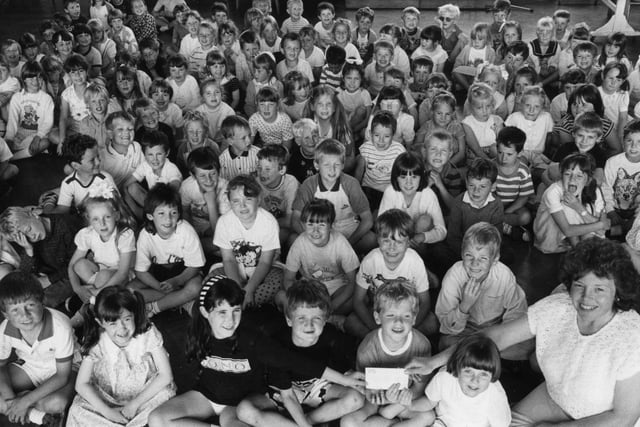 This scene from June 1989 show pupils at Highfield Infants School but who can tell us more about the occasion?