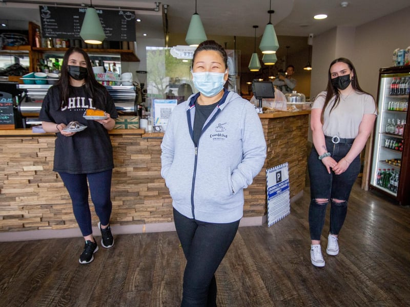 Jojo Cheung, 47, the owner of CrumbleJack, Fareham with staff, Ionica Suruianu and Lucy Sheppard. Picture: Habibur Rahman