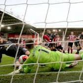 Sheffield United's Dean Henderson pulls off a stunning scrambling save to prevent Mario Vrancic from equalising during his side's 1-0 win over Norwich City at Bramall Lane. (Photo by Nigel Roddis/Getty Images)