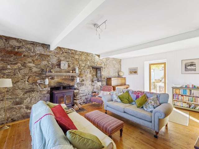 The 17th-century building has been tastefully decorated, featuring a mix of traditional and contemporary styling