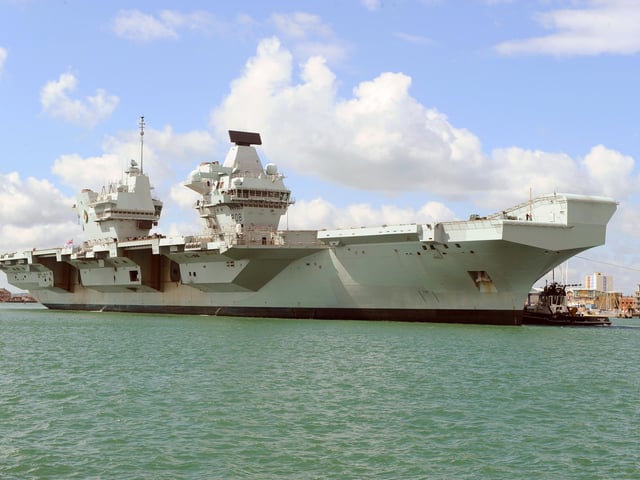Britain's biggest warship HMS Queen Elizabeth pictured returning to Portsmouth after 10 weeks at sea, carrying out critical training. Picture: (020720-815)