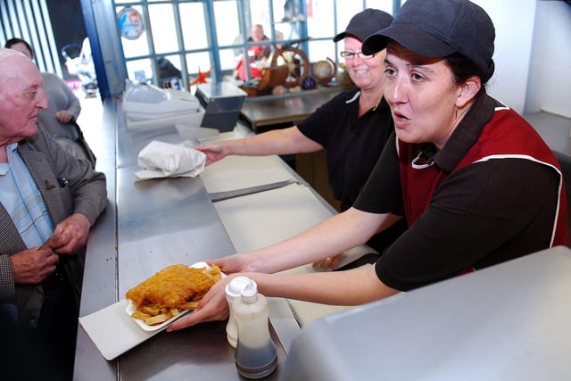 Sadly now closed, counter staff at Mariners Fish and Chip shop in Middleton Grange Shopping Centre serve hungry customers in this picture from 2013.