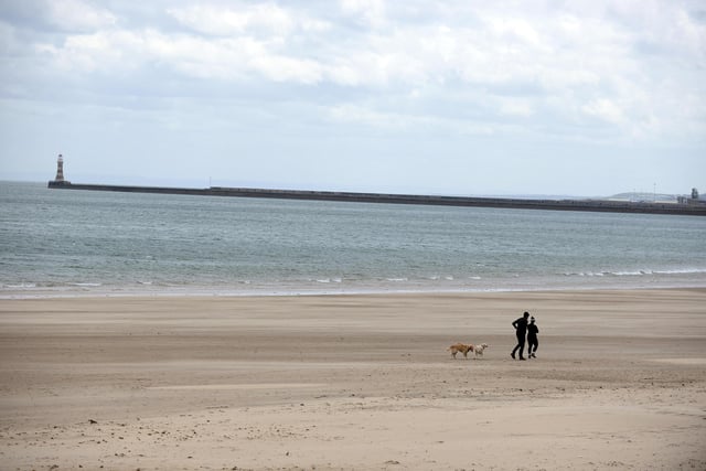 Families and couples have been stretching their legs on the beach at Roker.
