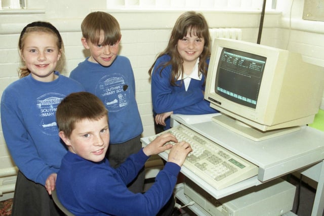 Pictured next to some new computers are these Southwick Primary students in 1996.