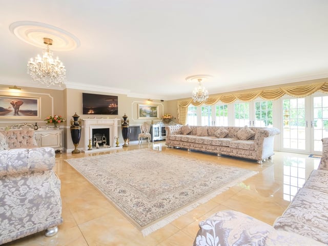 This huge five-bedroom Portsdown Hill home in Portsmouth is up for raffle. Pictured is its 8.71m x 8.15m drawing room.