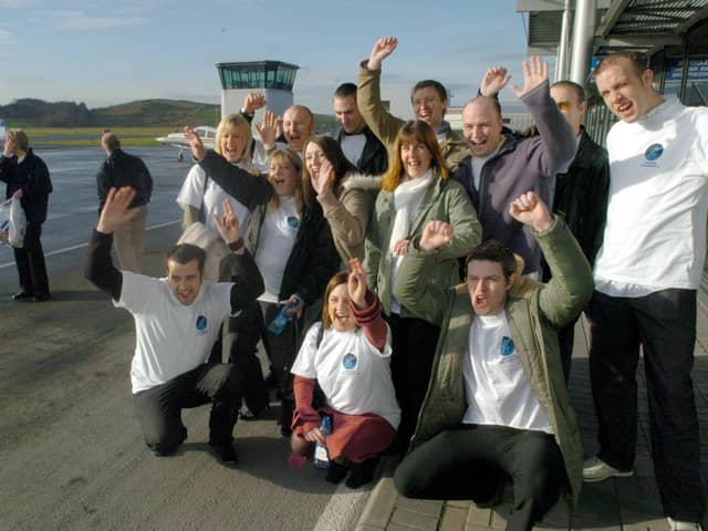 Employees at the O2 phone shop at Meadowhall pictured at Sheffield City Airport before their surprise helicopter flight to Wetherby racecourse in January 2005