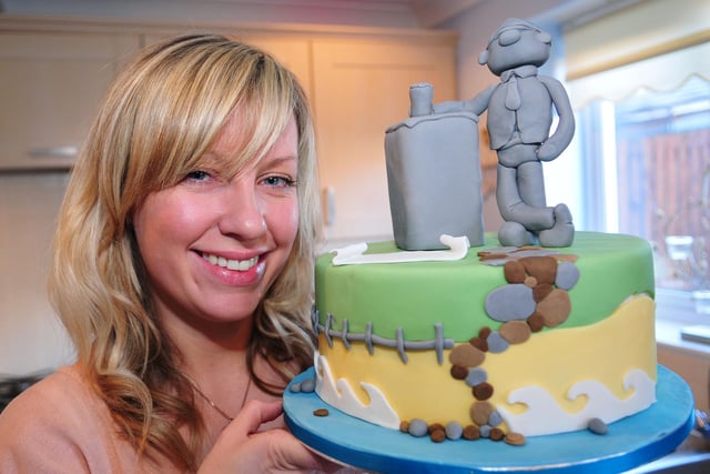 Rebecca Gray with an Andy Capp cake in 2013. Who can tell us more?