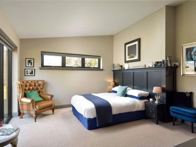 Four double bedrooms, including the comfortable master suite, are situated on either side of the U-shaped building. The bedrooms all enjoy spectacular views with floor to ceiling windows