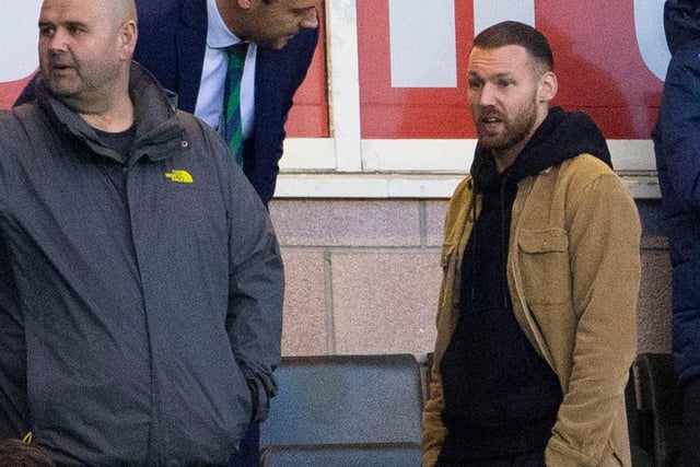 Hibs men winger Martin Boyle (R) watches on as wife Rachael Boyle steals the show at Easter Road.