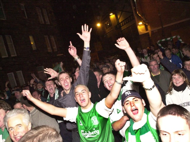Jubilant Hibs fans make their way down Albion Road following the landmark 6-2 mauling of rivals Hearts on 22 October 2000.