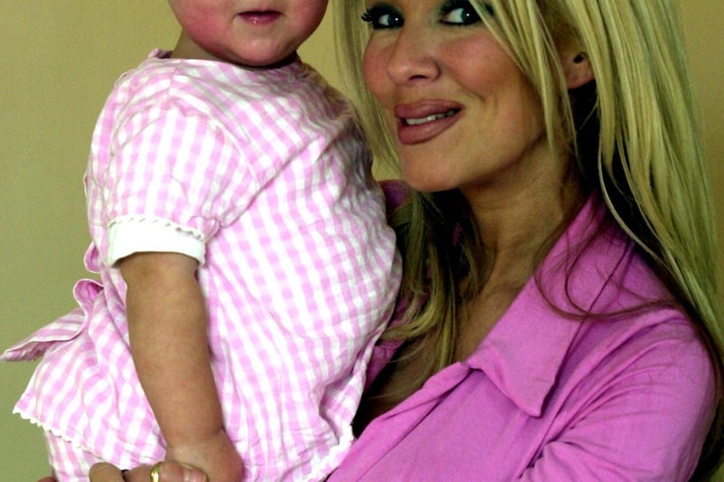 Pictured is Ashley Bond at home in Church St,Wales,Sheffield, with her 14 months old daughter Morgan back in March 2001
