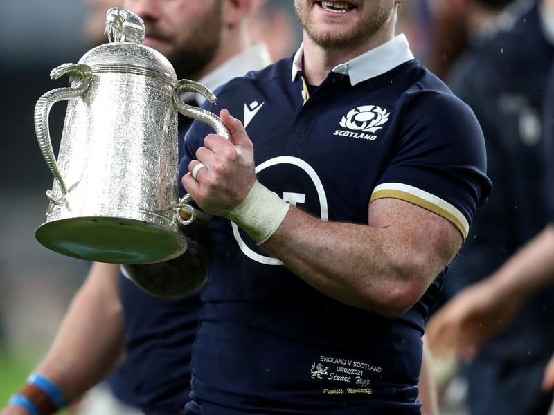 Scotland's Stuart Hogg lifts the Calcutta Cup after the Guinness Six Nations match at Twickenham Stadium, London
