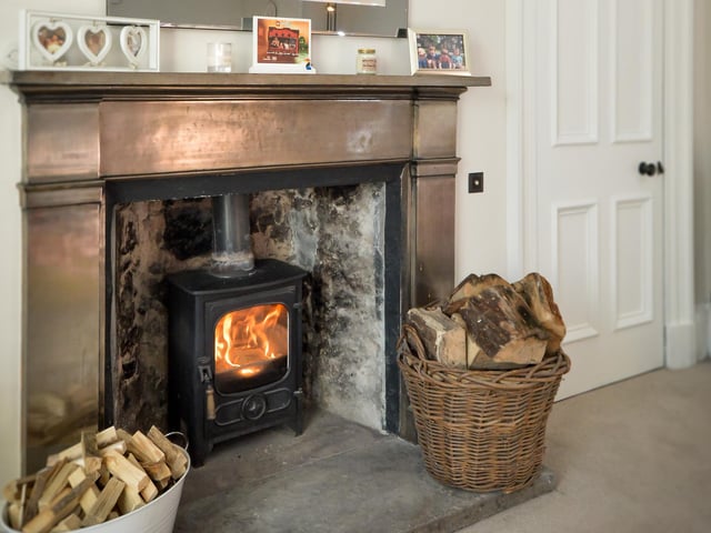 Period features such as this fireplace have been retained but brought bang up to date