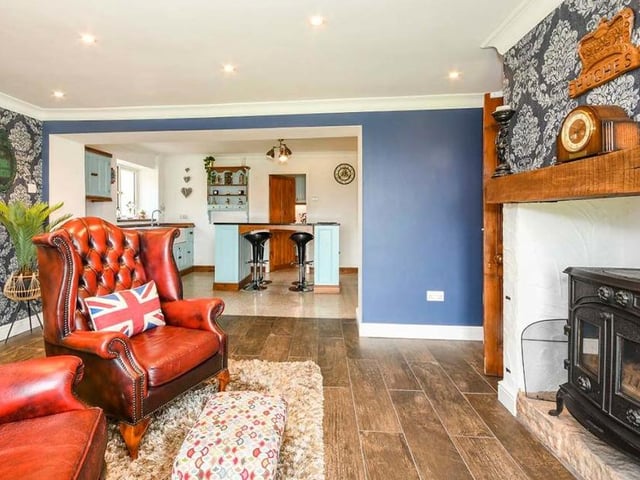 Another view of the kitchen/diner, which boasts a wonderful multi-fuel log-burner. As you can see the room leads into the kitchen area.