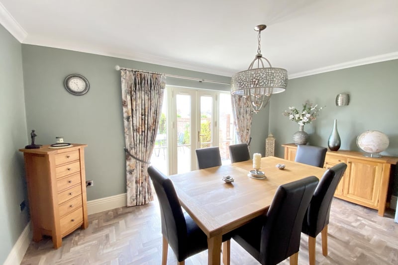Coved ceiling, ceiling spotlights, two double-glazed windows to the front and one to the rear, double radiator, underfloor heating, tiled floor and surround, TV point, chrome-effect plug and light points.
