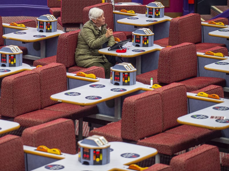 A bingo-goer enjoys playing the game again at Buzz Bingo at Meadowbank Shopping Park.