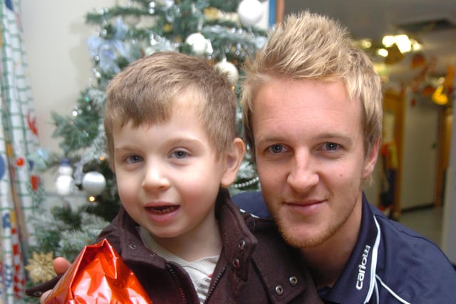 James Coppinger meets six-year-old Ewan Bradford of Thorne during Christmas