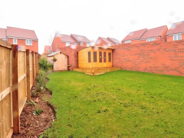 The back garden also features a summerhouse, which could be turned into an office, and a shed, which is useful for storage.