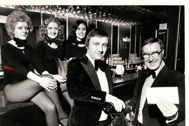 Josephines: Dave Allen (pouring champagne) opened Josephines in 1976