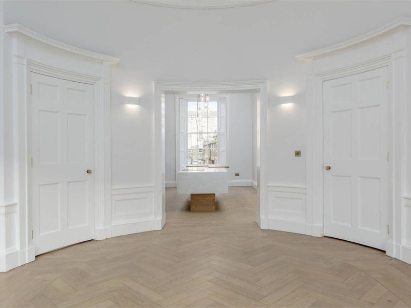 Sitting room looking through to kitchen.