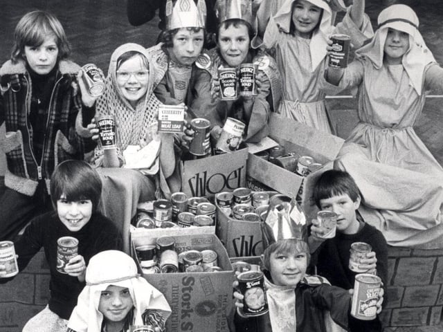 Pupils at Beck School, Sheffiel,d wth their display of tinned foods for the Telegraph and Star Old Folks Fund, raised by a Christmas concert at the school, on December 14, 1979