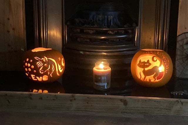 Eve Ingledew's pumpkins showing a cat and unicorn, sent in by Katy Ingledew.
