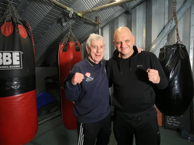 Alwyn pictured with Robert Riley, who runs Riley's boxing & fitness centre.